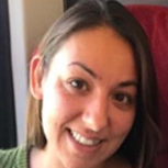 dog sitting and fan blowing at him