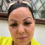 dog sitting and fan blowing at him