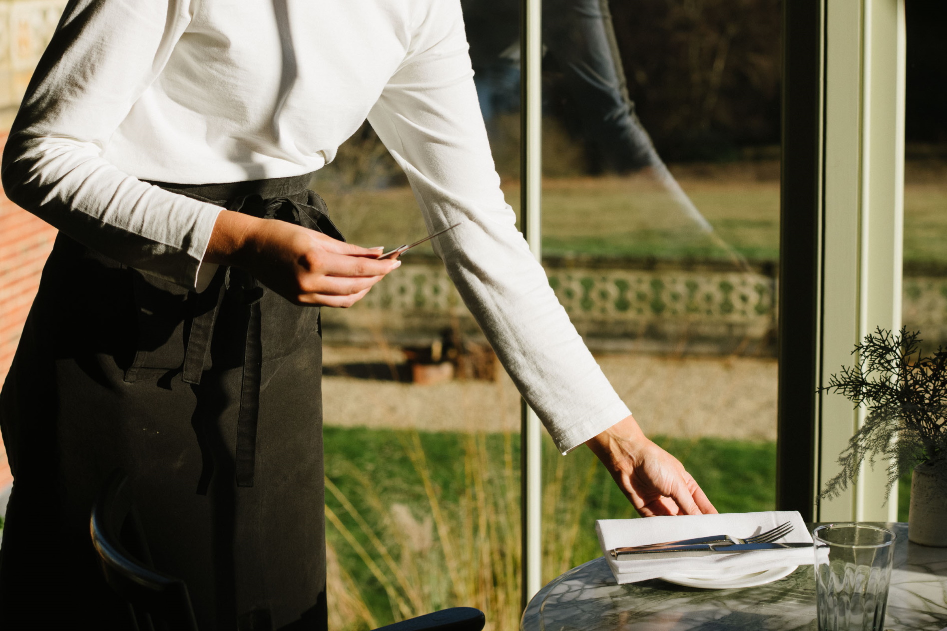 waitress serving a table