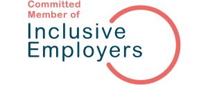 Words saying Committed to Inclusive Employer on a white back ground and a red circle going through the words inclusive employer